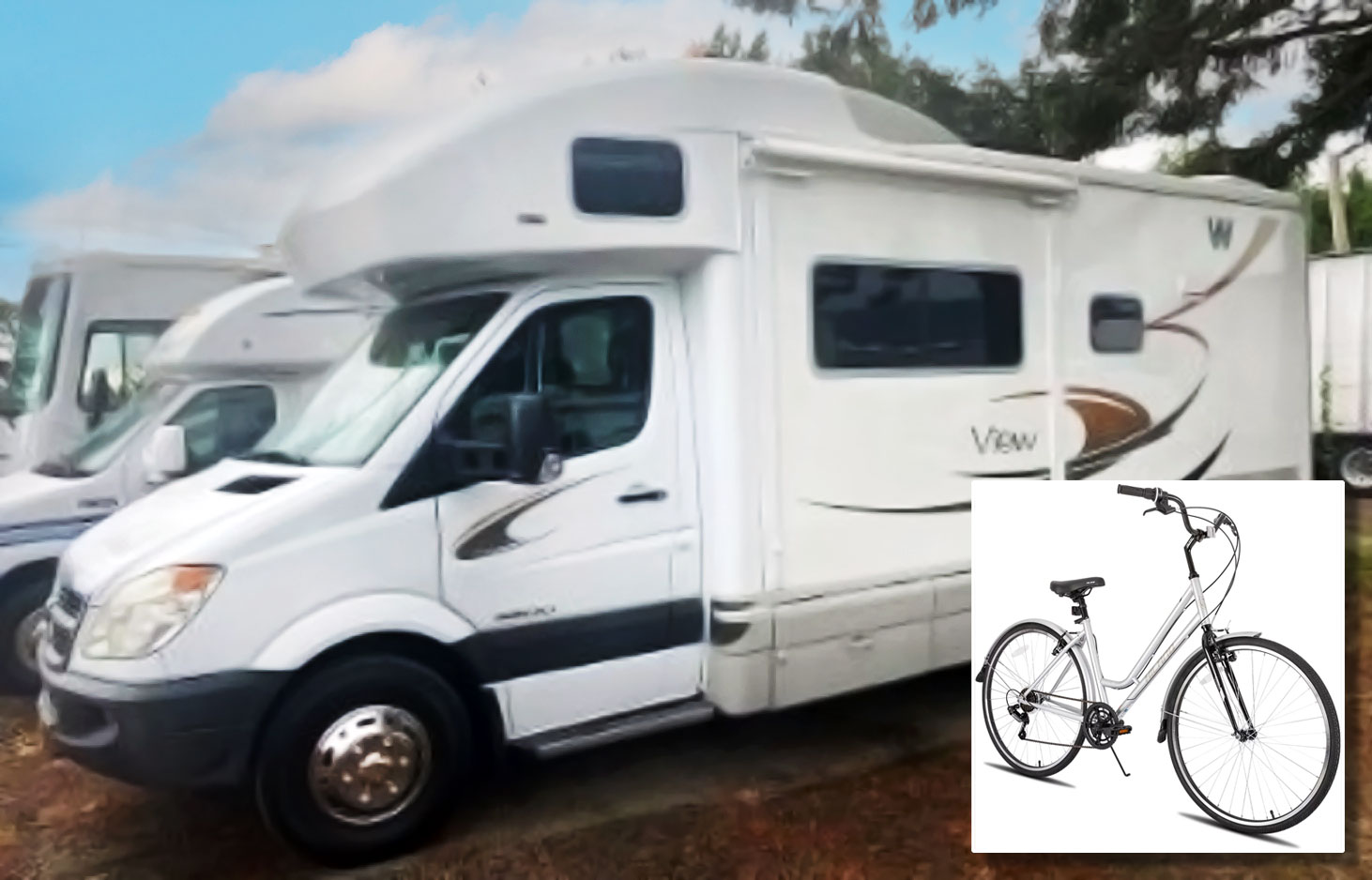 White small RV and white urban bicycle